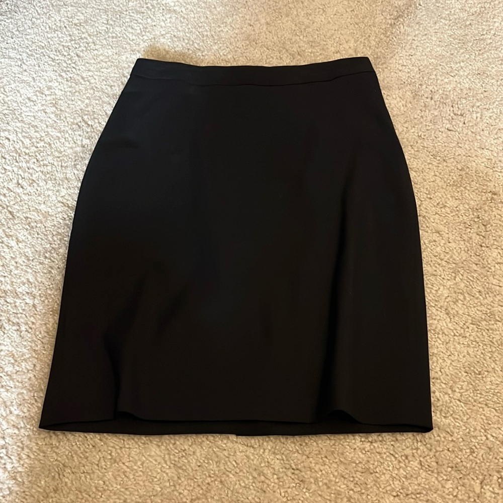 Black fully lined pencil skirt , never worn